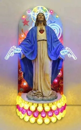 פסל ישו מואר בניאון, שני אקדחי ניאון משני צדדיו
